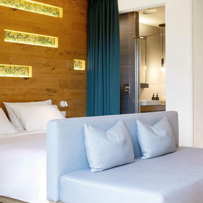 Oasi Junior Suite - Think of an oasis where you can feel well: through design, every detail in this suite tells the story of the Astoria Resort park