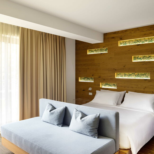 Oasi Junior Suite - Think of an oasis where you can feel well: through design, every detail in this suite tells the story of the Astoria Resort park