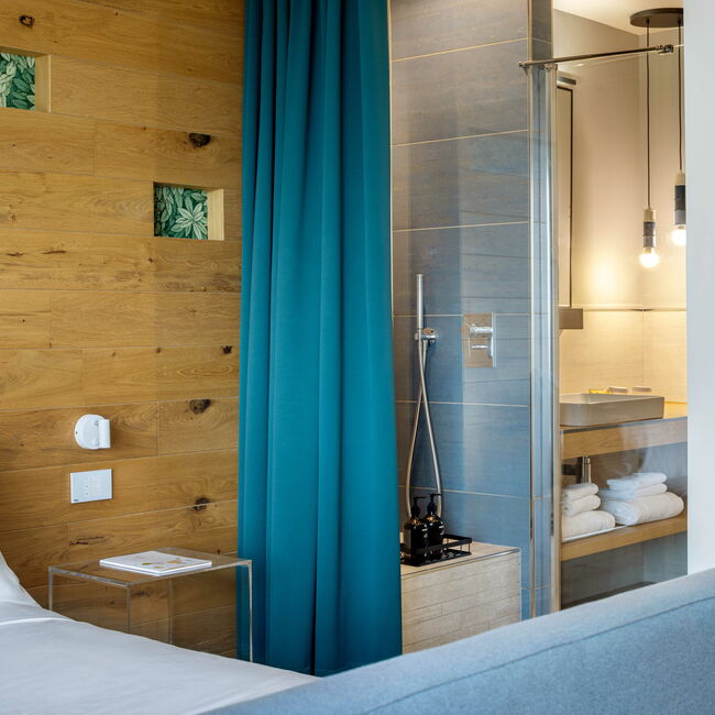 Oasi Junior Suite - Think of an oasis where you can feel well: through design, every detail in this suite tells the story of the Astoria Resort park